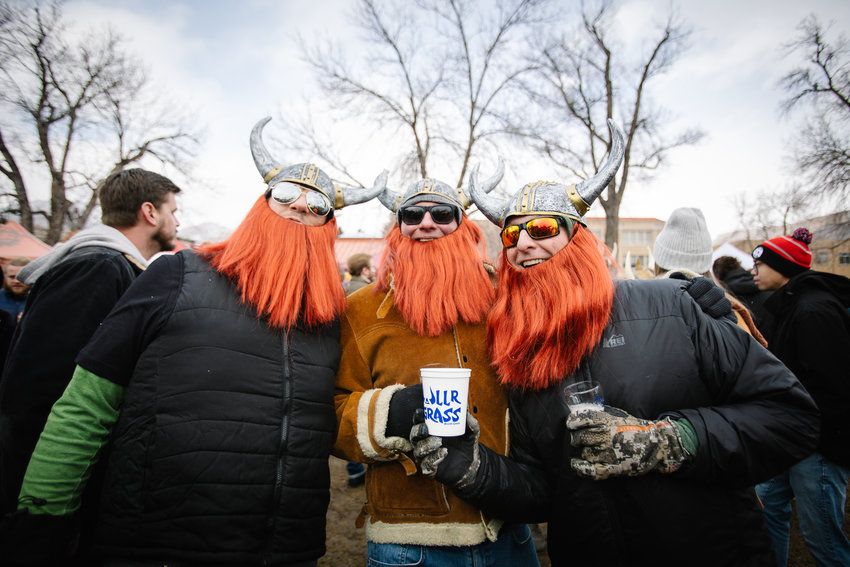 From left, Aaron Foley, Tyler McDonald and Scott Foley wear matching beards and Viking hats at UllrGrass on Saturday.